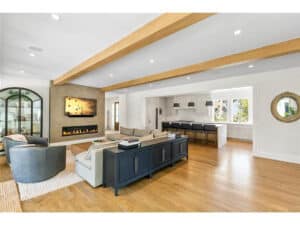 Streeter Built Living Room with fireplace eat in kitchen and hardwood floors at Lakeview Avenue Deephaven