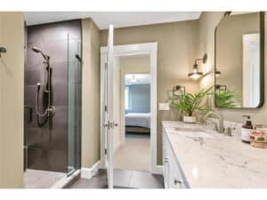 Streeter built lower level bathroom, tile shower, one sink, large vanity at Lakeview Avenue Deephaven