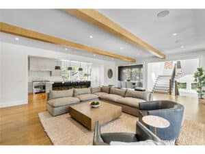 Streeter Built Living Room with fireplace eat in kitchen, dining room and hardwood floors at Lakeview Avenue Deephaven