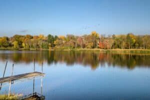 Calm Lake with Fall Colors and dock