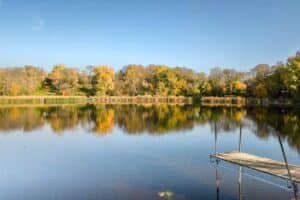 Calm Lake with Fall Colors and dock